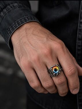Multi color rainbow Dragon Eye ,being held claw Dungeons ring